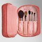 Trish McEvoy's tiny, all-in-one portable makeup case includes five of Trish's professional brushes for travel, plus secret compartments for stashing all of your on-the-go necessities. With this trusty little case at your side, you'll always be prepared, wherever the day takes you.